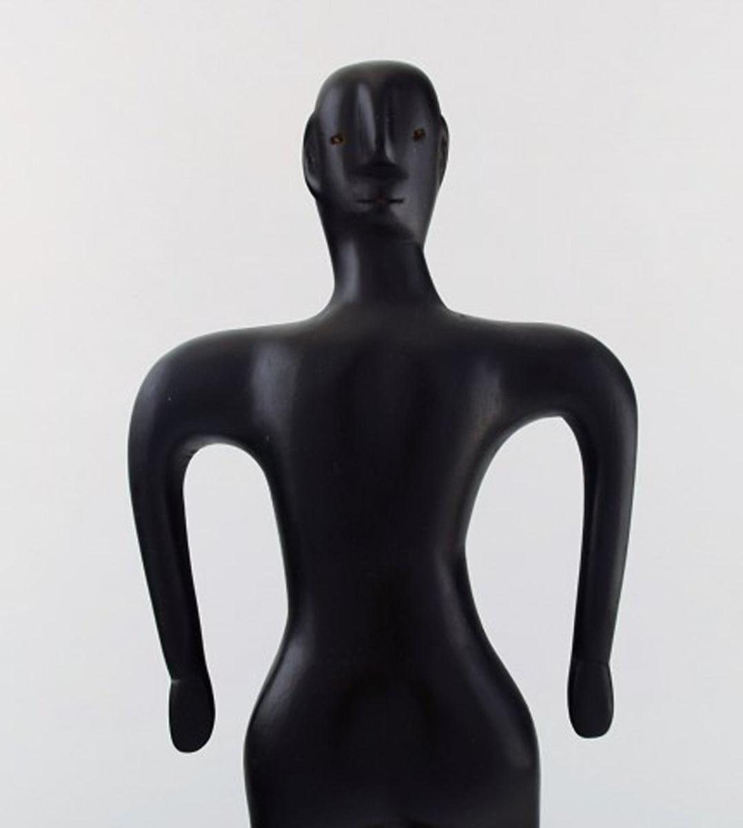 Naivist folk art from Haiti. Standing man on base carved in wood. Mid ...